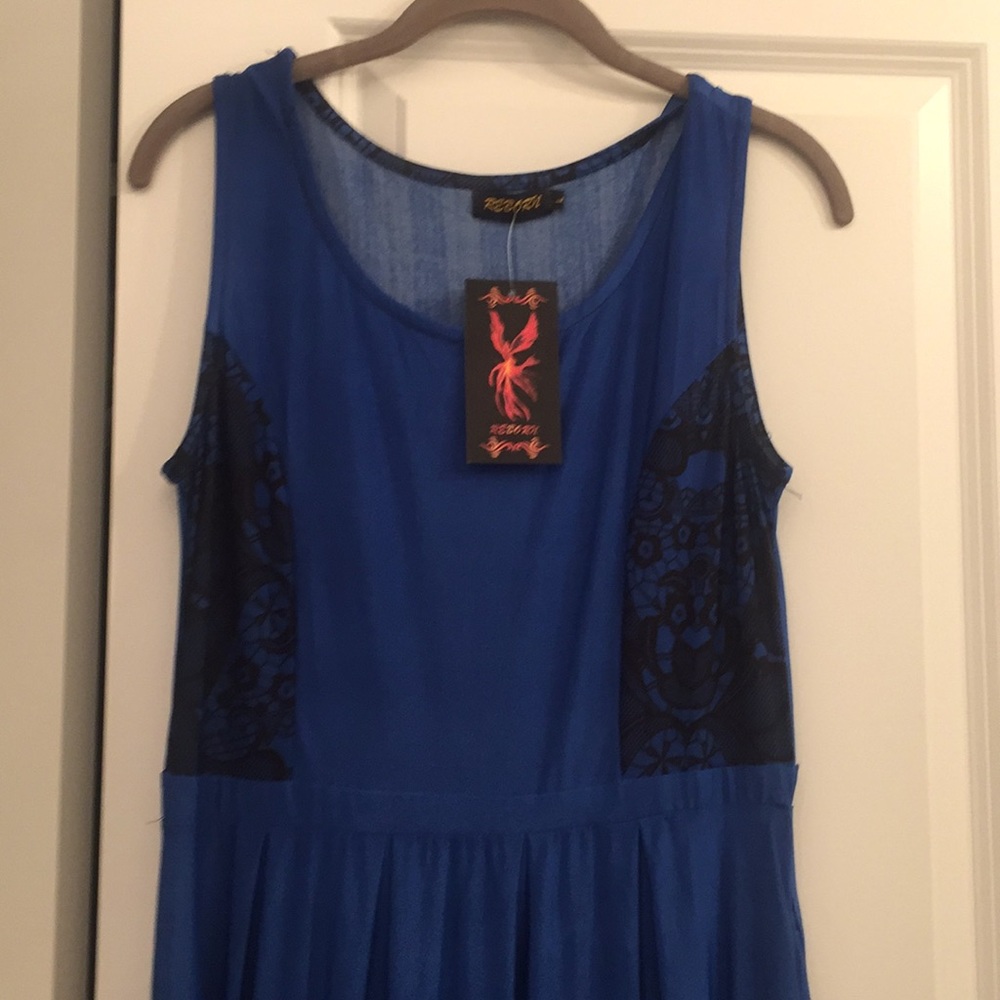 Blue dress. Lace print design - Picture 2 of 3